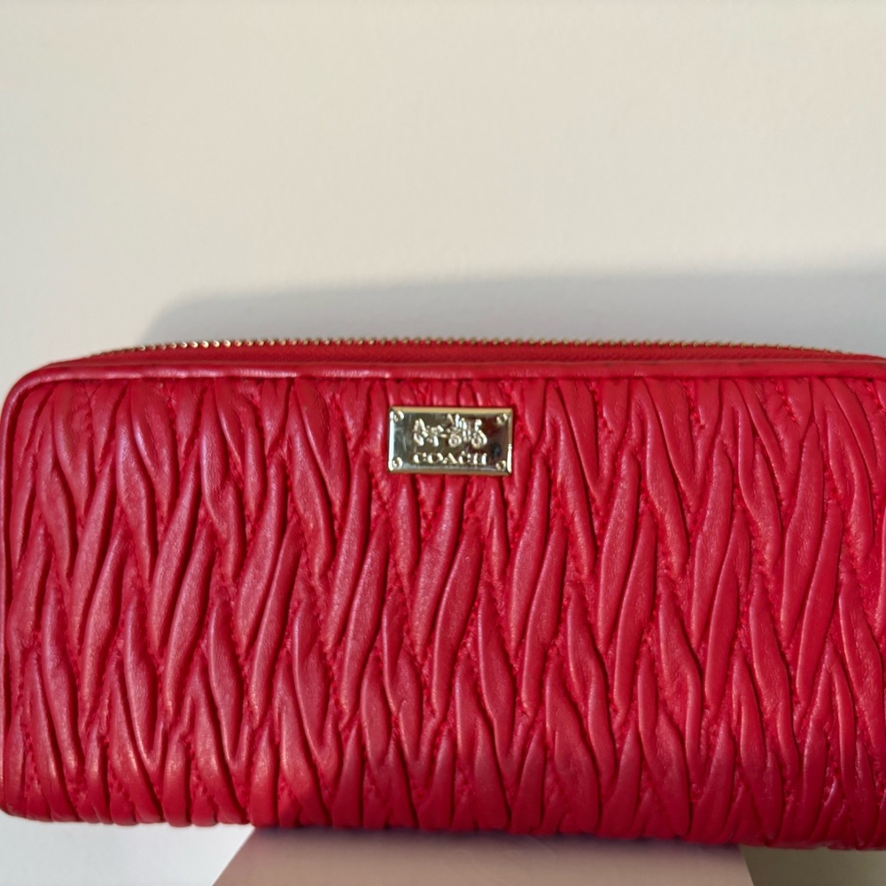 Coach “Mad Twist” leather full wallet